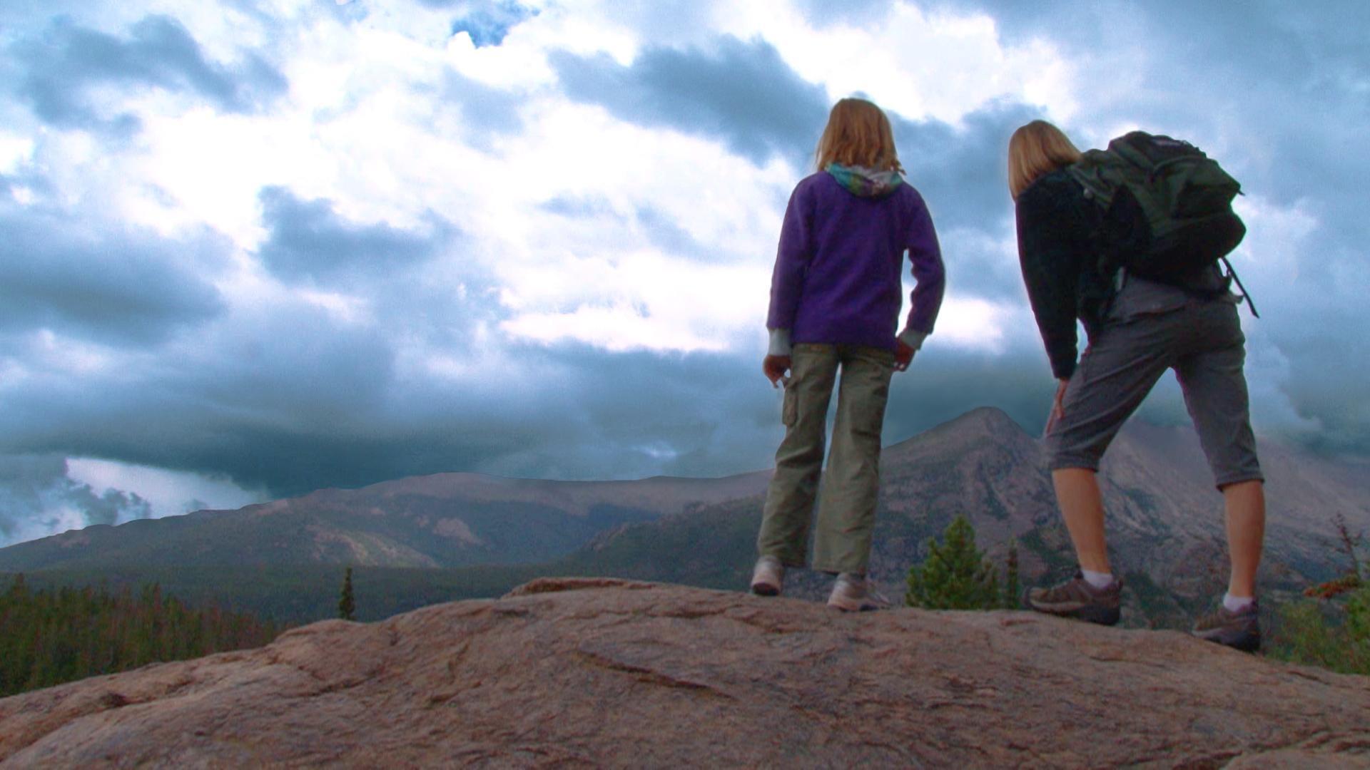 Families hike mountains in two places: how are they different and how are they similar?